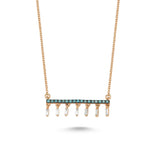 Rose gold necklace featuring a central round-cut blue diamonds and dangling baguette-cut diamonds